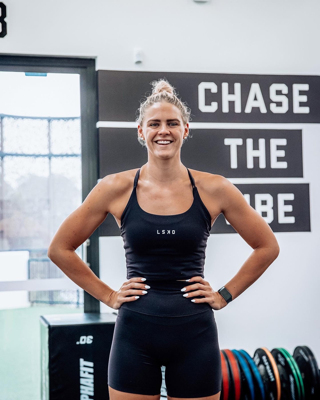 Shayna Jack training in a gym wearing LSKD activewear