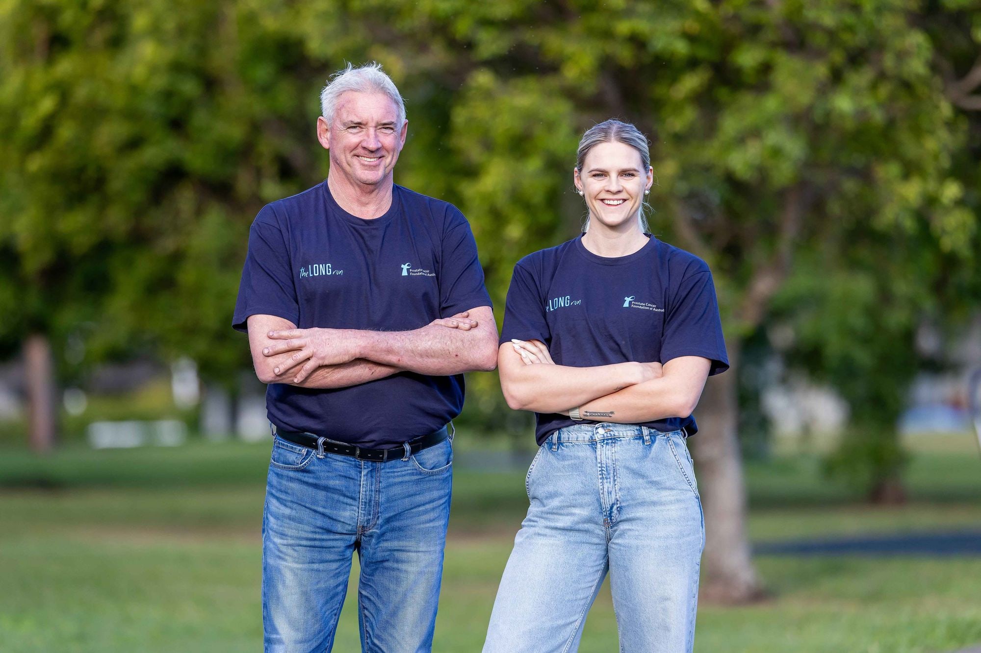 Shayna Jack and a fellow supporter with arms folded, in matching The Long Run T-shirts for the Prostate Cancer Foundation of Australia.